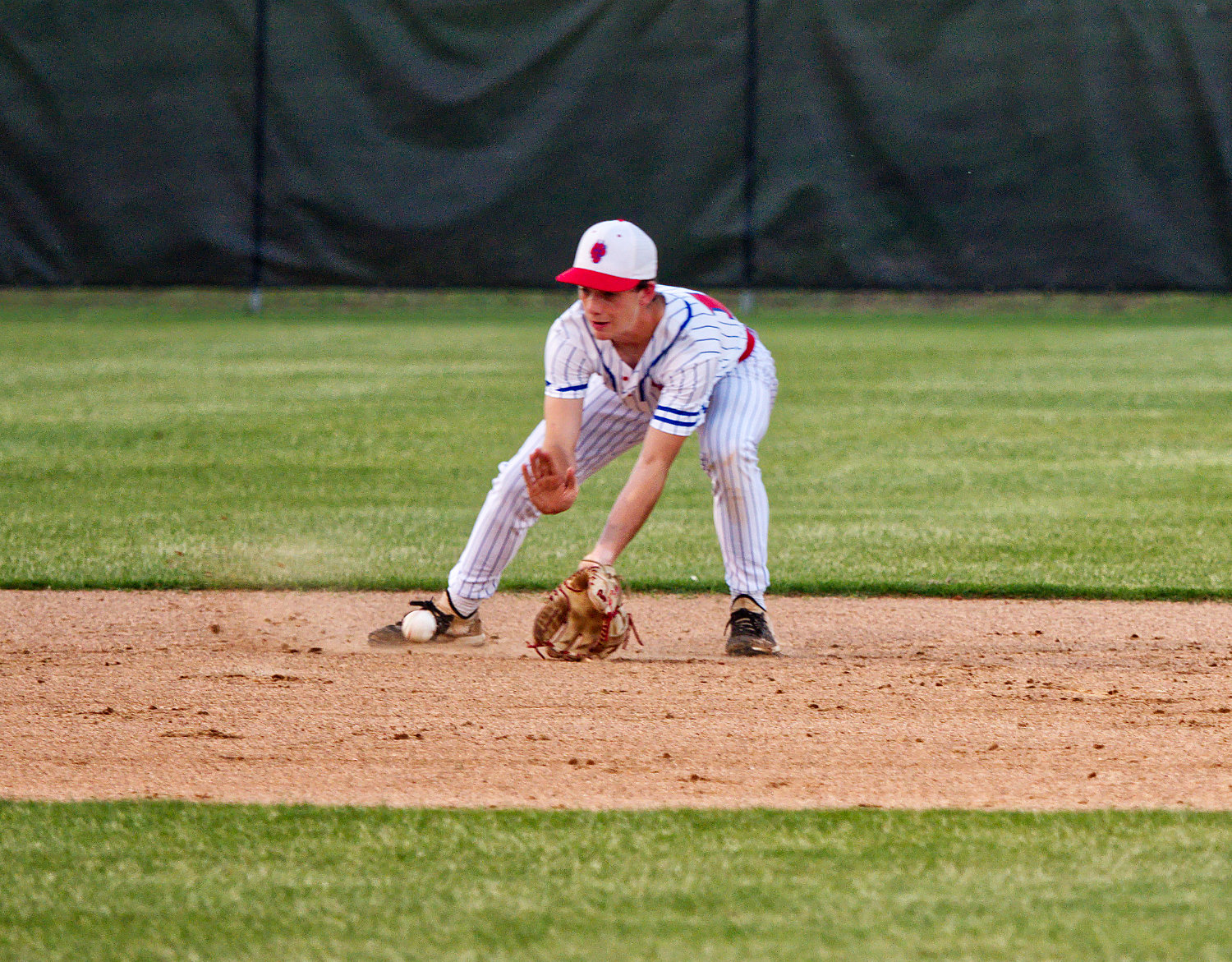 Alba-Golden shortstop Easton Campbell fields a grounder in Friday’s first game of the two-game playoff with Rivercrest.
